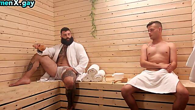 Inked hung got deepthroated by skinny twink in sauna