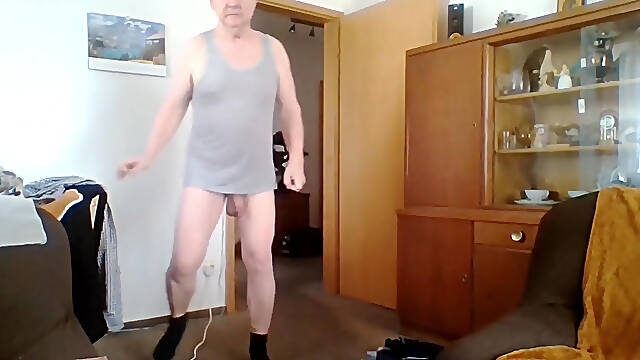Andreas with suspender belt and bra jerking off